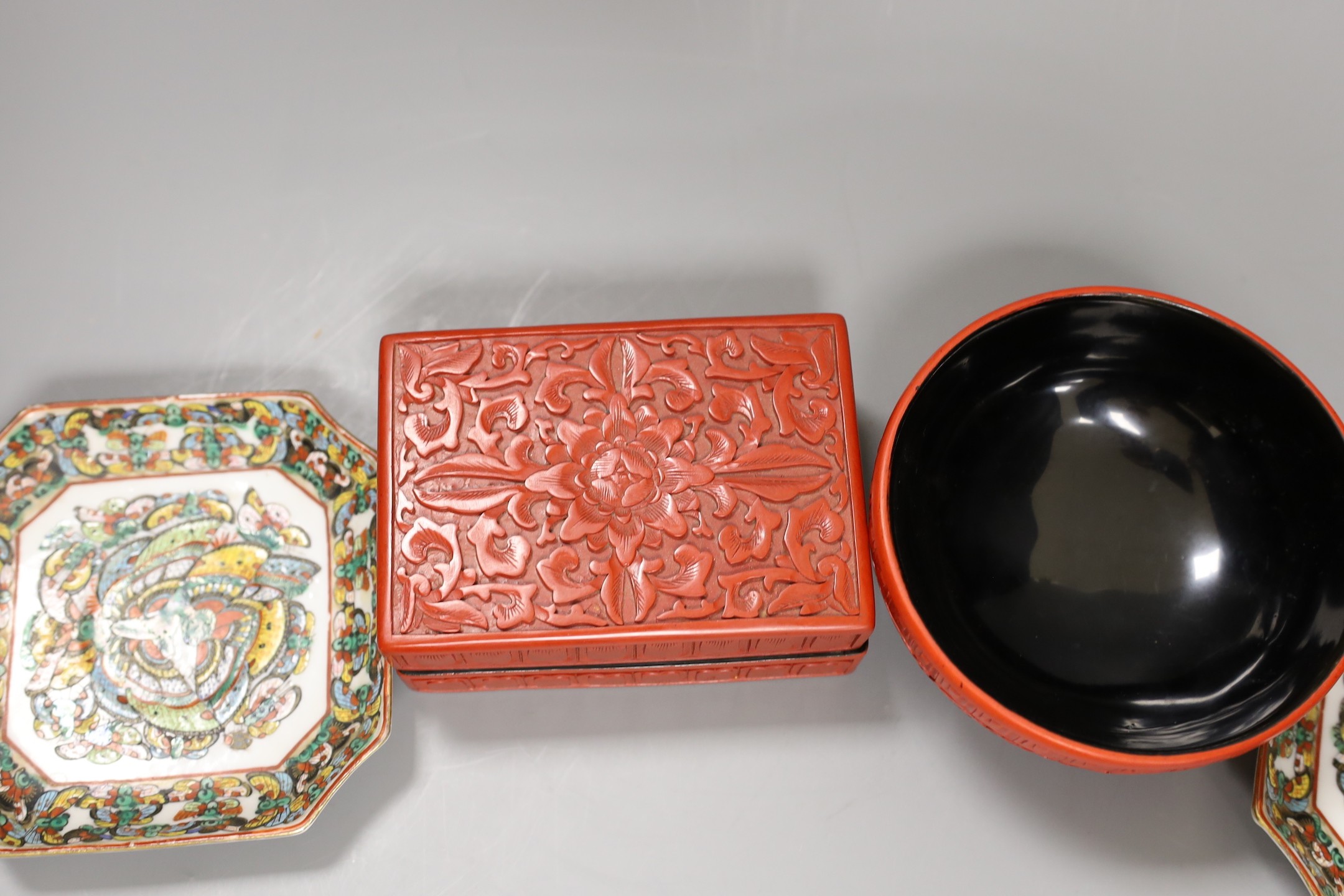 A Chinese cinnabar lacquer bowl, a similar box and cover and two Chinese famille verte thousand butterfly dishes